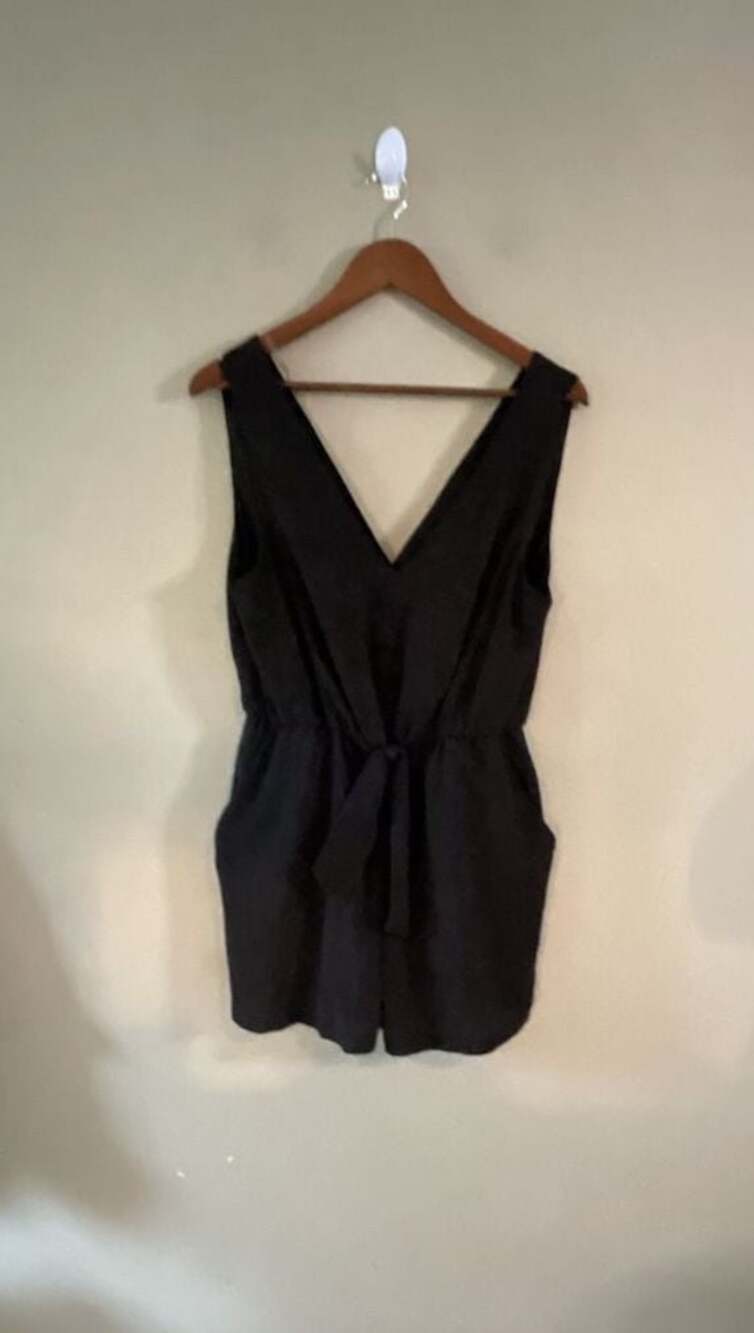Lily Rose Black Sleeveless V-Neck Tie Front Romper with Pockets